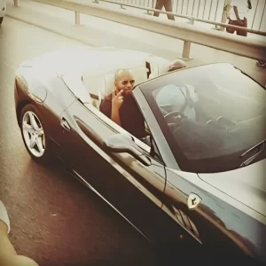 Joho inside a Ferari
