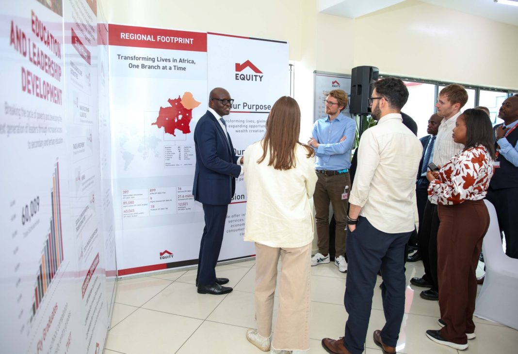 Equity Bank Kenya Managing Director, Moses Nyabanda, addresses MBA students from Oxford University during their visit to the Equity Group Head Office in Nairobi.