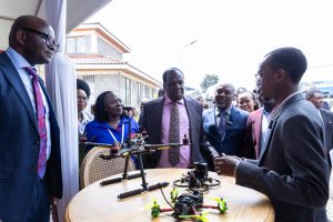 (l-r) Equity Bank Kenya Managing Director, Moses Nyabanda, KEPSA Director of SME & Start-Ups at Mary Ngechu, Cabinet Secretary for Cooperatives and MSMEs Development Wycliffe Oparanya, and Equity Bank Kenya Director for SMEs, Collins Wanyonyi follow a demonstration of drone operation by Dronector Limited Founder and CEO Kevin Githinji (near right) at the Equity tent during the MSME Day 2025 marked in Nairobi.