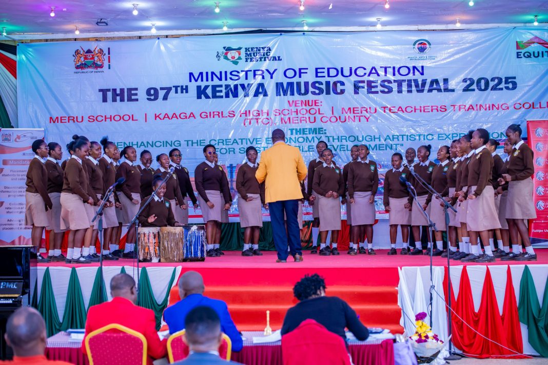 Makueni Girls perform a song on insurance in an Equity-sponsored theme at KMF. Makueni was number three