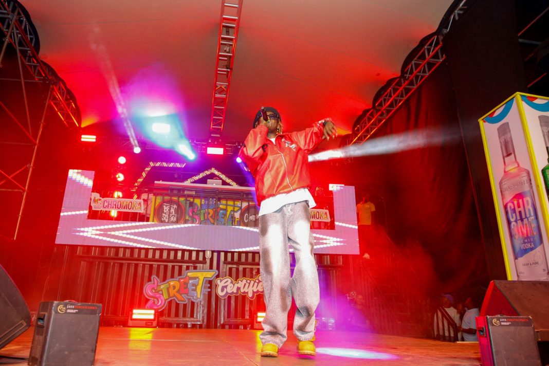 Music artist Fathermo electrifies the crowd with a high-energy performance during the Chrome NCP Campaign launch at Juja City Mall on October 9, 2025.