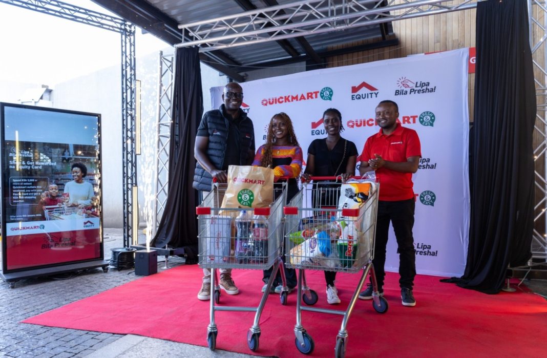 Equity Bank Managing Director Moses Nyabanda poses with Quickmart Kamakis customers Faith Kamoshe and Nancy Koki, lucky winners of the Equity and Quickmart Lipa Bila Presha partnership. Looking on is Quickmart Chief Commercial Officer Joseph Thuku.