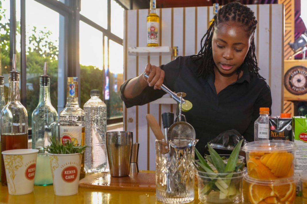 Kenya Cane Mixologist at the Wape Wape Listening party held at The 1922 Lounge (1) (1) (1) (1)